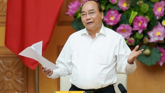 政府總理阮春福在會議上發表演講。（圖源：元宇）