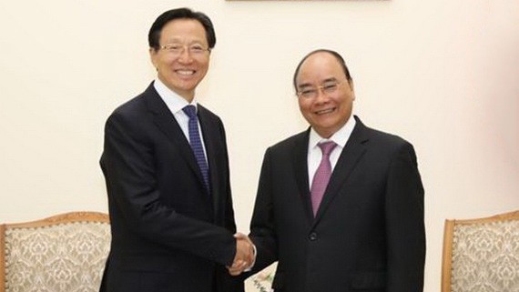 政府總理阮春福（右）接見中國農業農村部長韓長賦。（圖源：越通社）
