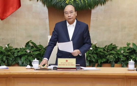 阮春福總理主持政府11月份例會並發表講話。（圖源：越通社）