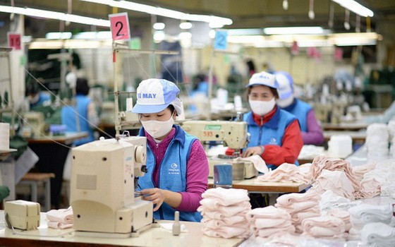 冬春針織廠致力投入口罩生產。（圖源：Vinatex）
