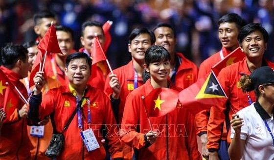 參加第三十屆東運會的越南體育代表團。（圖源：越通社）