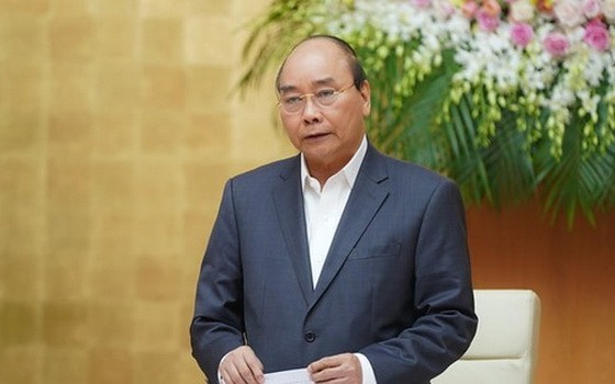 政府總理阮春福在會議上致開幕詞。（圖源：VGP）