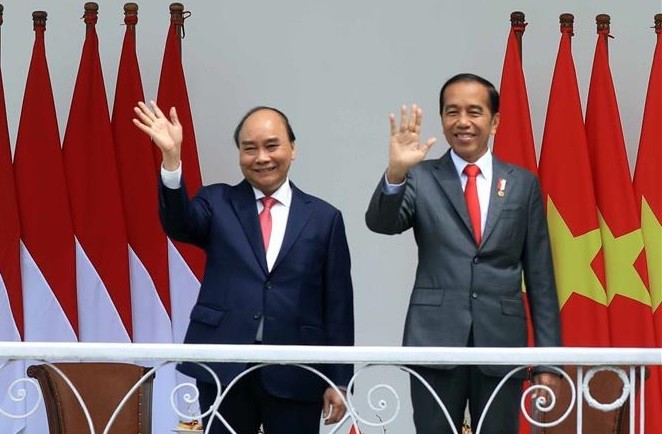 印尼總統主持儀式歡迎越南國家主席阮春福訪問。（圖：越通社）