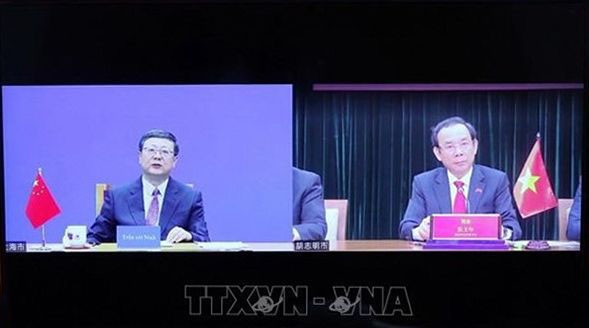 胡志明市市委书记阮文年已与中国共产党中央政治局委员、上海市委书记陈吉宁举行视频会议。（图：越通社）