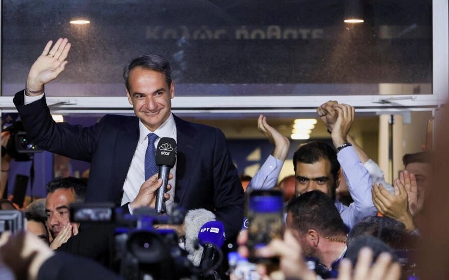 希腊总理米佐塔基斯宣布其领导的新民主党在国会大选中胜出。（图：路透社）