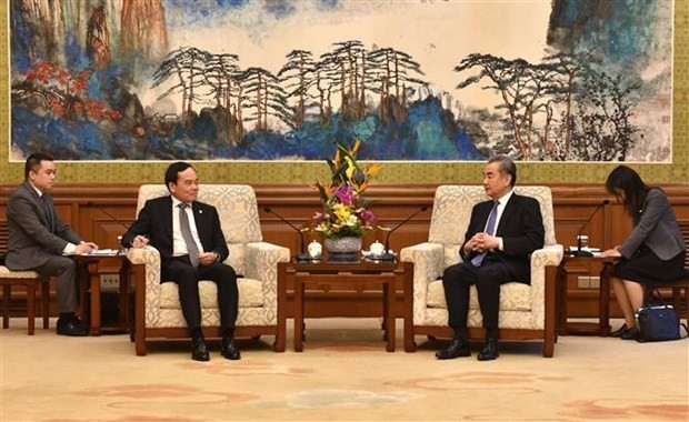 越南政府副总理陈留光会见中国外交部长王毅。（图：越通社）