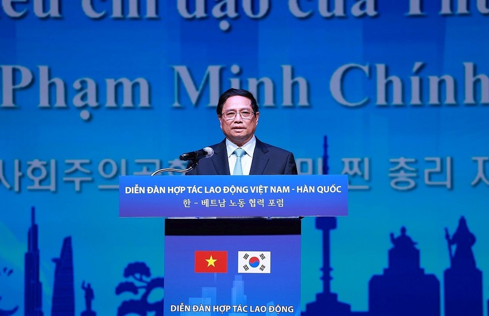 越南政府总理范明政在越南-韩国劳务合作论坛上发言。（图：越通社）