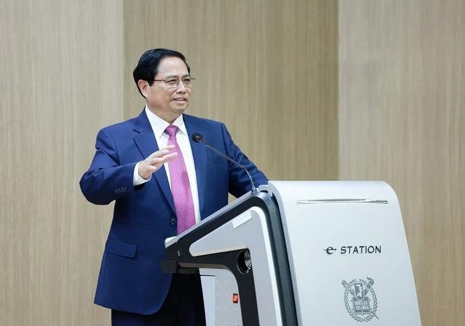 越南政府总理范明政发表重要讲话。（图：越通社）