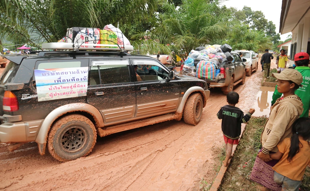 Lực lượng cứu hộ quốc tế đổ về Attapeu, Lào. Ảnh: ĐOÀN KIÊN