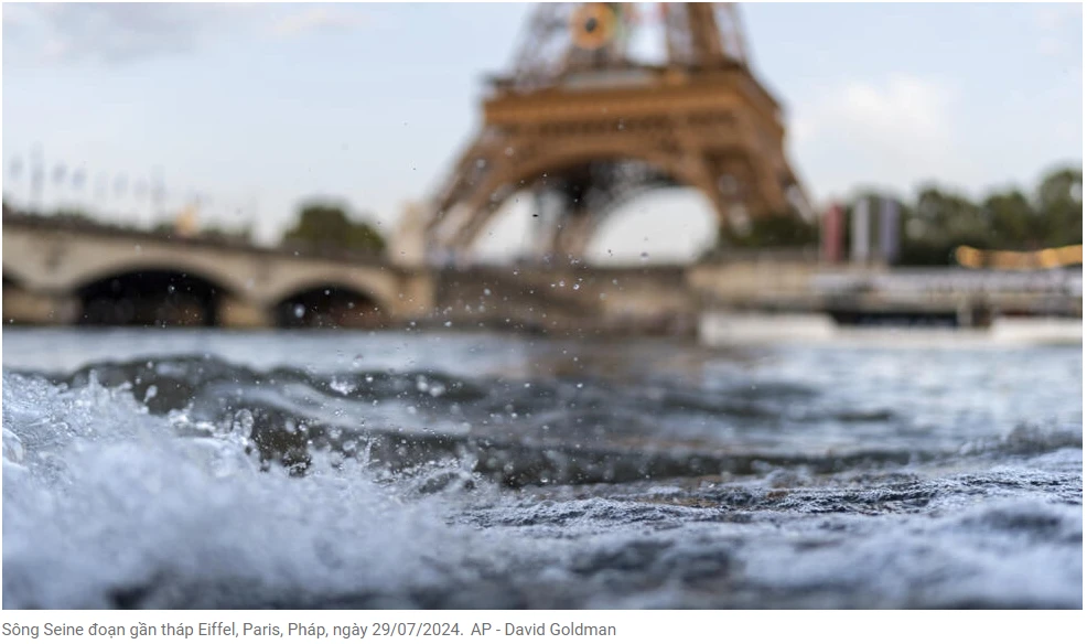 Nắng nóng ở Paris khiến làng Thế Vận thiếu máy lạnh. Sông Seine vẫn đục, không thể thi đấu