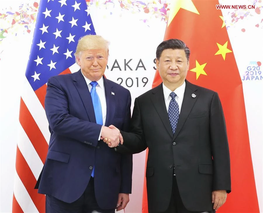 Tổng thống đắc cử Mỹ Donald Trump và Chủ tịch nước Trung Quốc Tập Cận Bình trong một cuộc gặp tại Osaka, Nhật Bản năm 2019. Ảnh: TÂN HOA XÃ 