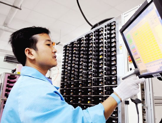 The man working for an US electronic firm in HCMC (Illustrative photo: SGGP)