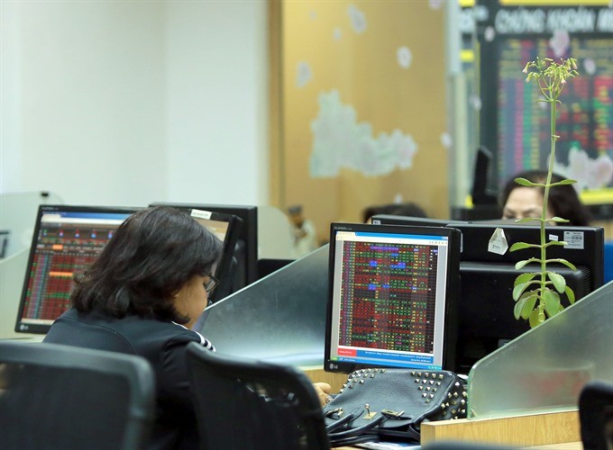 Investors at Bao Viet Securities Company. (Photo: VNS)