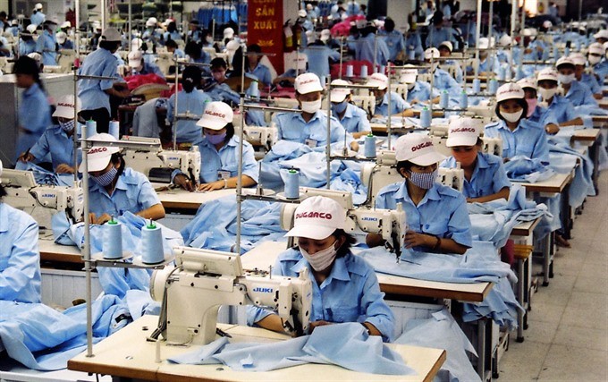 Garment products for export at Duc Giang Corp, an affiliate of Vietnam Textile and Garment Group.  (Photo: VNA/VNS)