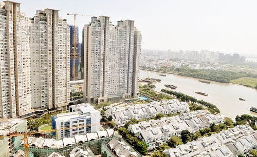 Real estate market is on strongly developing trend. The photo shows buildings in HCMC (Photo: SGGP)