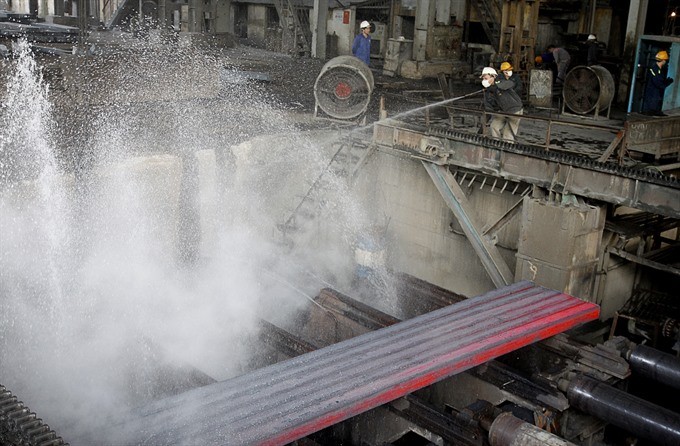 Steel billet is cooled at Luu Xa Steel Mill, a provider of ingot steel for Thai Nguyen Iron-Cast Steel Plant. (Photo: VNA/VNS)