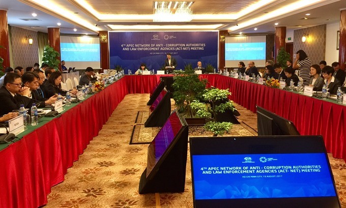 Delegates from 21 APEC-member economies at the 4th Meeting of the APEC Network of Anti-Corruption Authorities and Law Enforcement Agencies in HCM City on Saturday. (Photo: VNS)