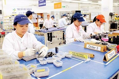 Workers at Misumi Group Company in Linh Trung export processing zone, HCMC (Photo: SGGP)