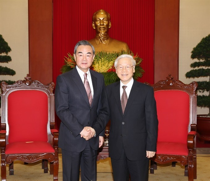 General Secretary of the Communist Party of Vietnam (CPV) Nguyen Phu Trong (right) hosted a reception in the capital city of Hanoi yesterday for Chinese Foreign Minister Wang Yi, who’s on a three-day visit to Vietnam. (Photo: VNA/VNS)