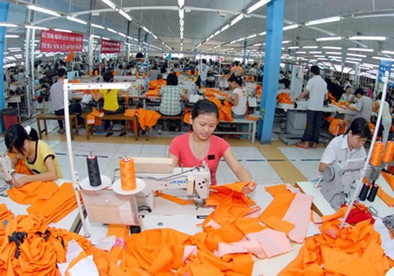Suit making for export at Nha Be Garment Company (Photo: SGGP)