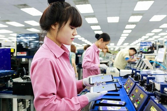 Workers at the smart phone production of Samsung SEVT plant in the northern province of Thai Nguyen