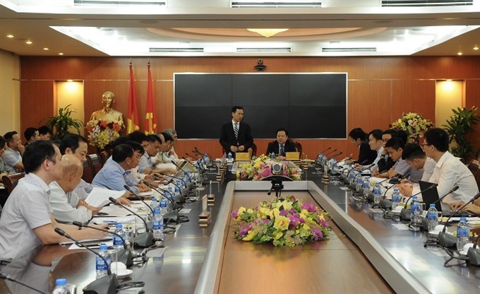 Leaders of CMSC and MIC at the meeting.  Photo baochinhphu.vn