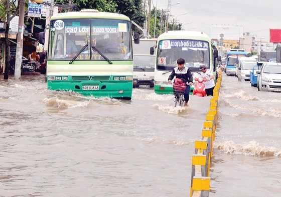 HCMC strives to terminate street flooding by 2020 (Photo: SGGP)