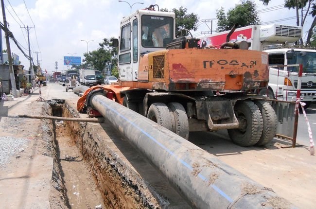 HCMC is striving to develop its urban infrastructure to provide safe water, control flooding and reduce traffic congestion. (Photo: thesaigontimes.vn)