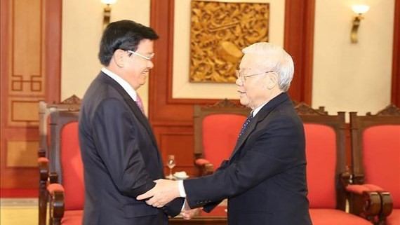  General Secretary of the Communist Party cum President of Vietnam Nguyen Phu Trong receives Prime Minister Thongloun Sisoulith
