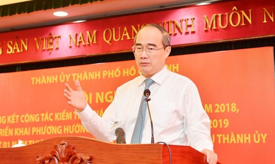 Secretary of HCMC Party Committee Nguyen Thien Nhan delivers a statement at the conference on January 16 (Photo: SGGP)