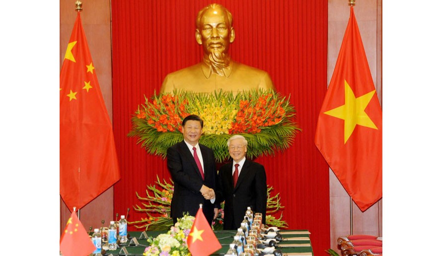 Party General Secretary and President Nguyen Phu Trong (right) and his Chinese counterpart Xi Jinping (Photo: VGP)