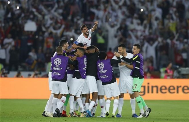 Qatari players celebrate their victory (Photo: Xinhua/VNA)