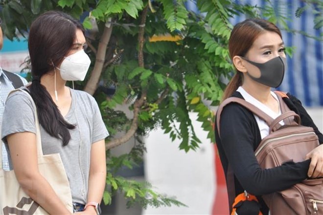 People in Bangkok wear masks to avoid smog on January 14, 2019 (Photo: Xinhua/VNA)