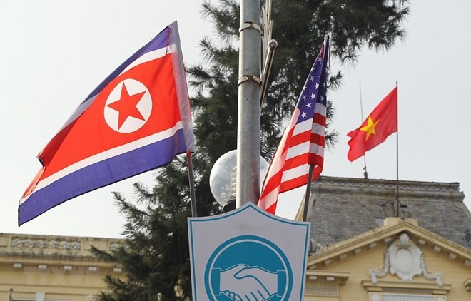 Streets in Hanoi are decorated with DPRK and US flags (Photo: VNA)