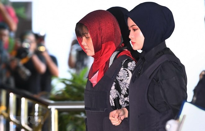 Doan Thi Huong is escorted to the Shah Alam High Court on March 14 (Photo: AFP/VNA)
