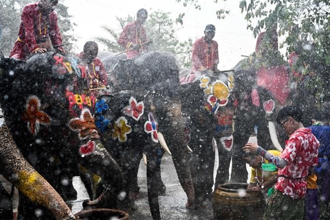 People celebrated Songkran holiday in Ayutthaya, Thailand on April 11 (Photo: AFP/VNA)