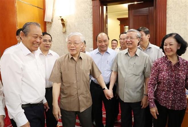 Party General Secretary and President Nguyen Phu Trong (second from left) at the meeting (Photo: VNA)