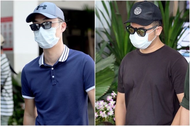 Tay Miow Seng (left), 40, and Ed Chen Junyuan, 37, were charged in court with operating a drone at an open field within 5km of Paya Lebar Air Base without a permit. (Photo: straitstimes.com)
