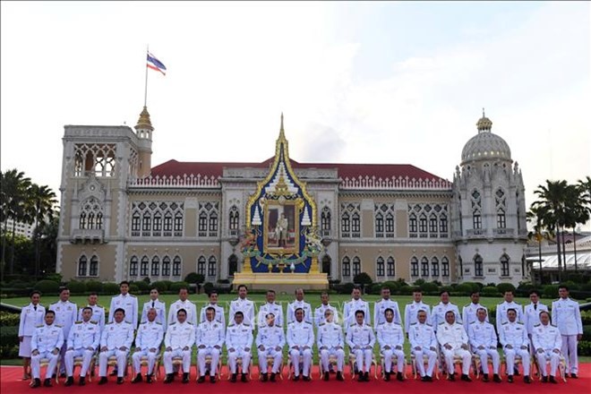 New cabinet members of Thailand led by Prime Minister Prayut Chan-o-cha have been sworn in on July 16. (Photo: AFP/VNA)