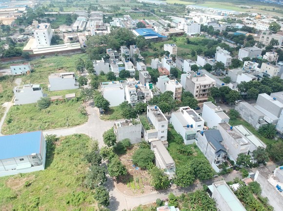 Tan Nhut commune Residential area and Mall. (Photo: SGGP)