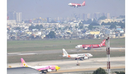 Planes from multiple airlines operating at Tan Son Nhat International Airport