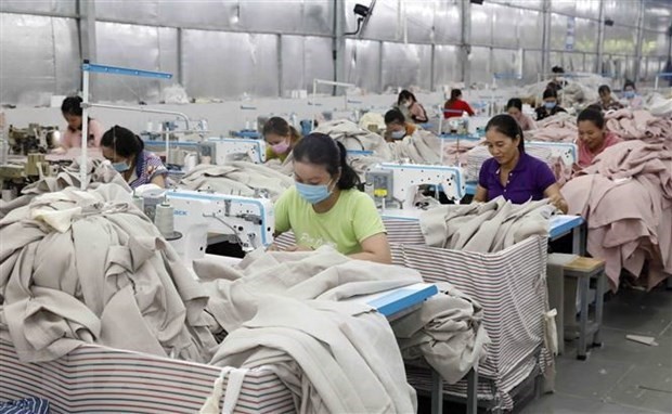 Vietnam not only successfully contained the pandemic but also posted a GDP growth of 2.91 percent, with the International Monetary Fund (IMF) saying it was among countries with the best economic achievements. (Photo: VNA)