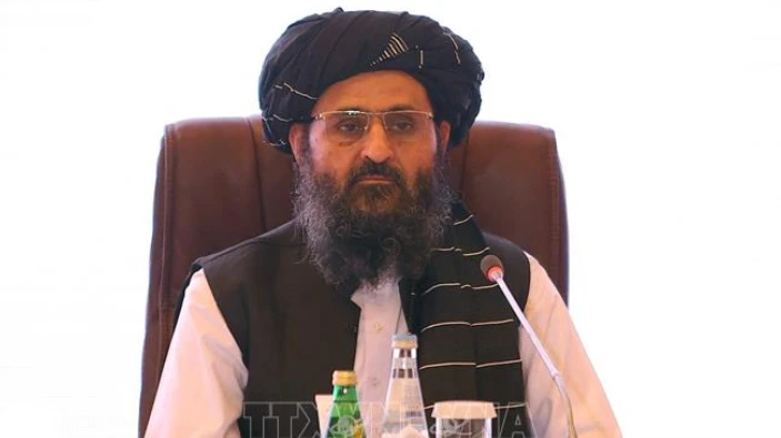 Trưởng đoàn đàm phán của Taliban Mullah Abdul Ghani Baradar, trong cuộc đàm phán với đại diện chính phủ Afghanistan ngày 18-72021. Ảnh: AFP/TTXVN