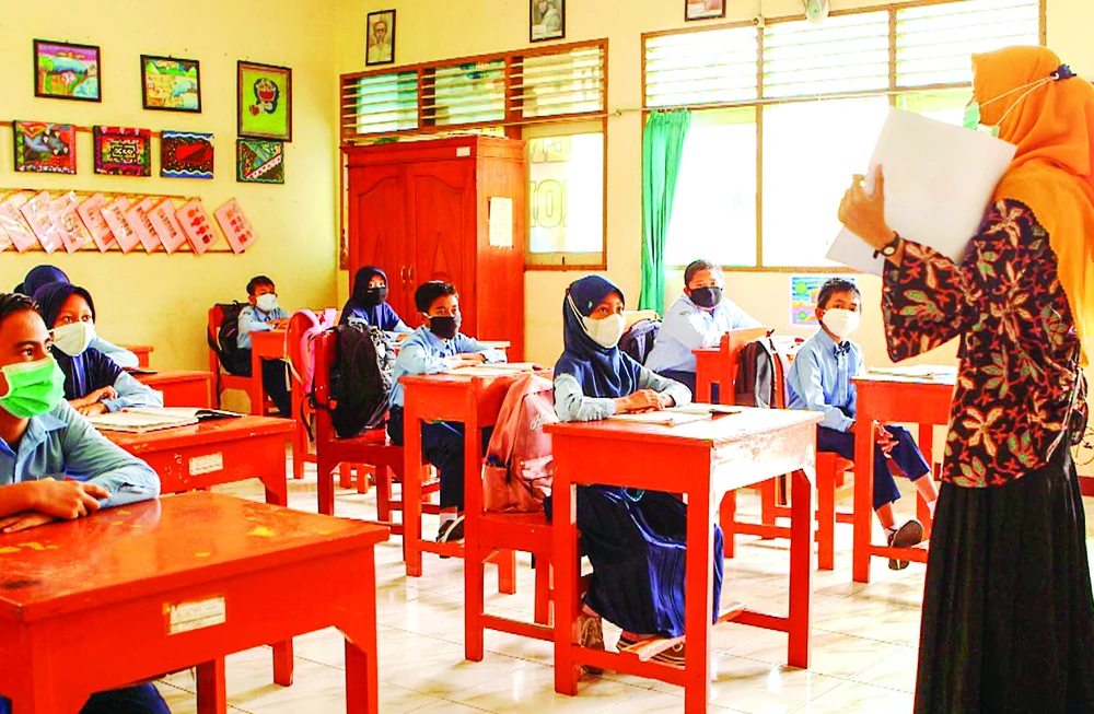 Một lớp học trực tiếp ở khu vực chưa bùng dịch Covid-19 tại Indonesia