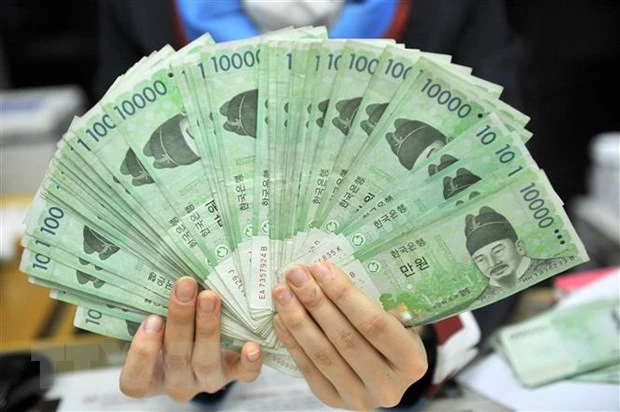 Đồng won của Hàn Quốc tại một ngân hàng ở Seoul. Ảnh: AFP/TTXVN