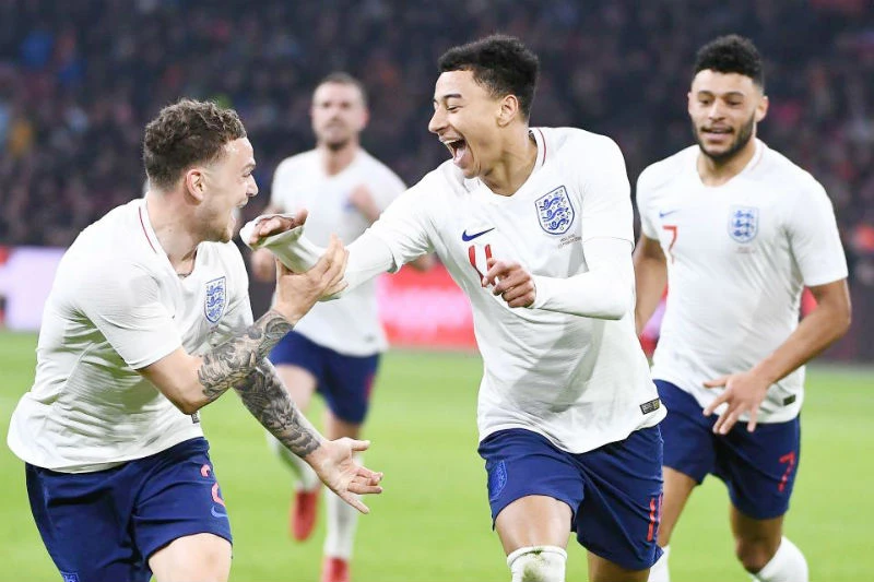 Jesse Lingard (giữa) ăn mừng bàn thắng quan trọng cùng tuyển Anh. Ảnh: Getty Images 
