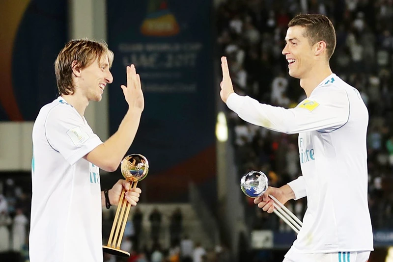 Modric muốn theo chân Ronaldo là chuyện không có gì khó hiểu. Ảnh: Getty Images