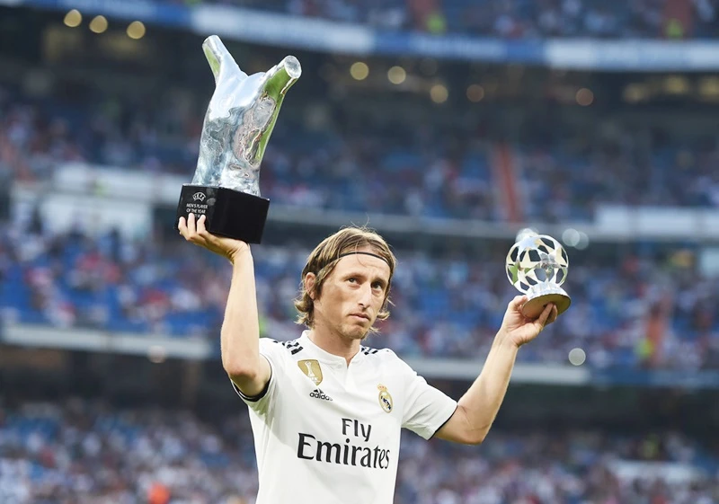 Modric sẽ tiếp tục đánh bại Ronaldo? Ảnh: Getty Images.
