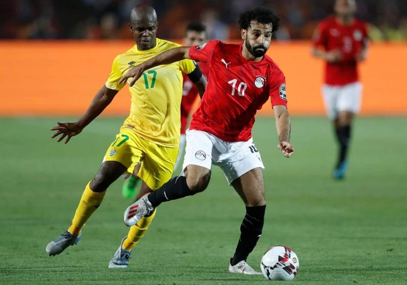 Mohamed Salah (phải) không thành công cùng tuyển Ai Cập nên sẽ trở lại sớm. Ảnh: Getty Images 