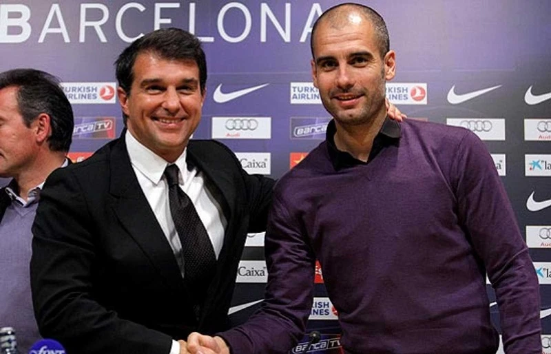 Joan Laporta sẵn sàng hợp tác với Pep Guardiola lần nữa nếu đắc cử Chủ tịch Barca. Ảnh: Getty Images